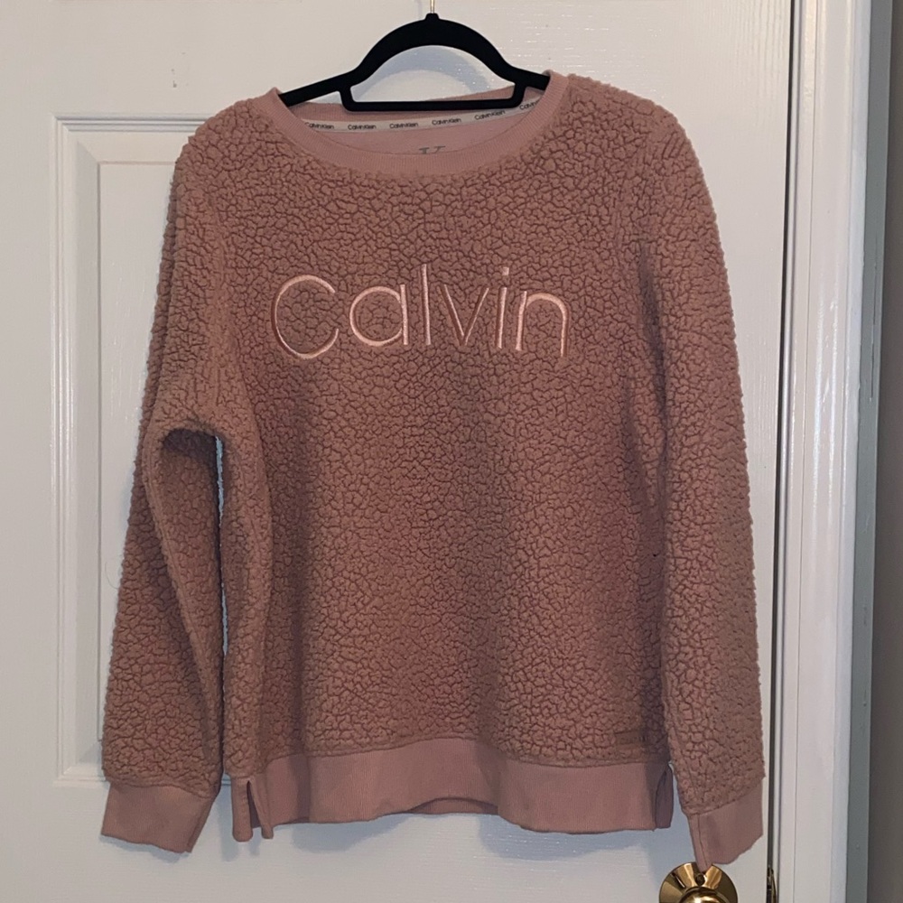 Pink Calvin Klein sweatshirt.